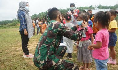 Edukasi Sejak Dini, Satgas TMMD Tebo-Jambi Pasangkan Masker ke Siswa SD dan PAUD