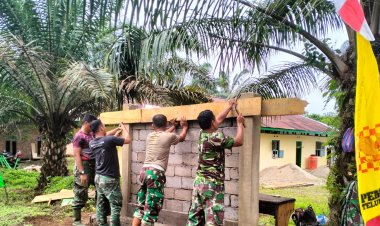 Madrasah Ibtidaiyah Nurul Falah Kini Lebih Dikenal Berkat Papan Nama Baru dari Satgas TMMD ke-123 Kodim 0416/Bute