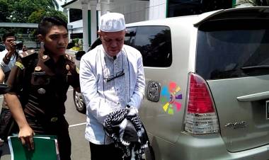 Diringkus saat Masih Berseragam Lengkap Haji, Berikut Kronologis Penangkapan DPO Kredit Fiktif BRI