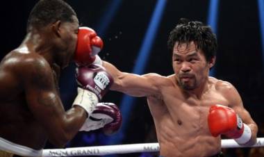 Pacquiao Tumbangkan Broner Kemenangan Unanimous Decision
