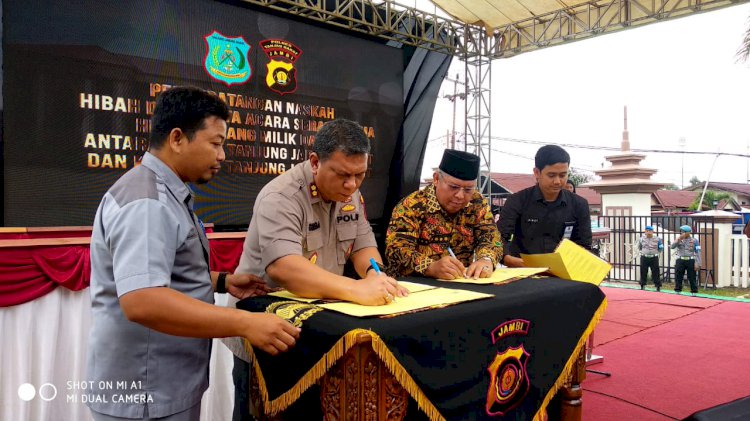 Pemkab Tanjabbar Hibahkan BMD kepada Polda Jambi dan Polres Tanjab Barat